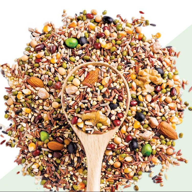 A pile of mixed nutritious grains and seeds with a wooden spoon in the center, with the text '20 Nutritious Grains' at the top on a white and pale green background.